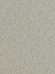 The surface has small polka dots scattered all around.