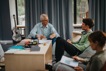 An experienced professor interacts with students in a cozy, informal setting, fostering discussion and collaborative learning. The scene highlights educational engagement and mentorship.