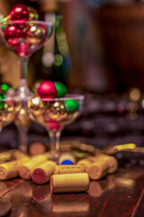 Festive Holiday Drinks Scene with Corks, Champagne Glasses, and Festive Ornaments (Cool Colours)