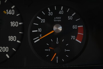 Analog speedometer in an internal combustion engine car at an auto show in Bangkok, Thailand, photographed on December 8, 2014.