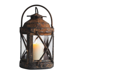 Rustic lantern illuminating soft candlelight in a darkened setting