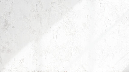 White cement wall in retro concept. Old concrete background for wallpaper or graphic design. Blank plaster texture in vintage style. Modern house interiors that feel calm and simple.