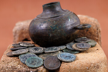 Ancient Roman coins with oil lamp. © Eduardo Estellez