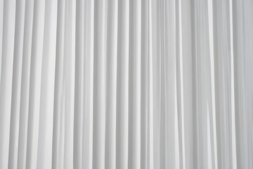 Obraz premium there is a white curtain with a black cat sitting on it