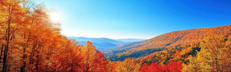 A stunning autumn view of the Green Mountains showcasing vibrant foliage under a clear blue sky during peak leaf season