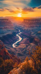 Fototapeten Breathtaking sunrise view over the Grand Canyon showcasing vibrant colors and the Colorado River winding through the landscape © vadosloginov