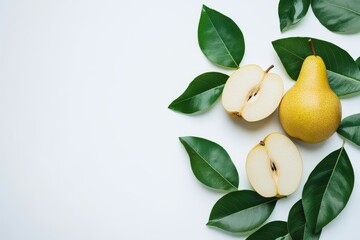 Green yellow pear fruit with pear half and green leaves isolated on white background