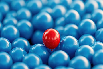 A conceptual image of a single red balloon among a sea of blue balloons, emphasizing individuality and standing apart from the norm.