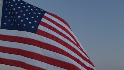 Obraz premium Waving American Flag at Dusk Outdoor Scenic View Symbol of Freedom Beautiful Landscape Inspirational Concept