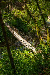 Wooden suspension bridge spanning tolmin gorges in slovenia