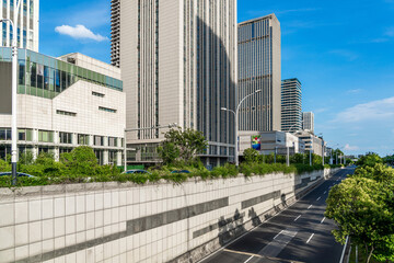 Modern Urban Landscape with Clear Blue Sky and Empty Street