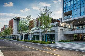Contemporary Urban Architecture with Green Spaces and Clear Blue Skies