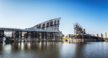 Modern Industrial Complex on Waterfront Under Construction