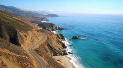 A stunning aerial view of a coastal landscape featuring cliffs, a sandy beach, and a shimmering ocean under a bright sun.