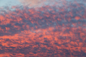 Serene Sunrise Sky with Vibrant Orange and Soft Blue Hues