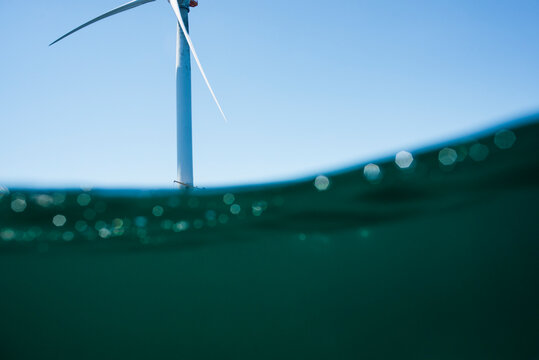Wind Turbine offshore New England in the Atlantic Ocean - Powered by Adobe