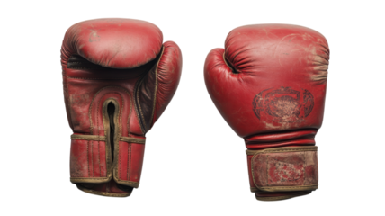A Pair of Red Boxing Gloves Ideal for Sports Promotion and Fitness Related Content Showing Training Equipment.