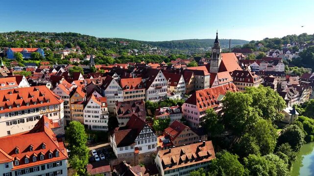 Aerial footage of circling closely over the old town of the city of T&uuml;bingen in South Germany
