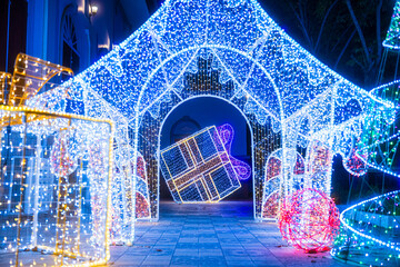 PHITSANULOK, THAILAND - December 15,2024:Decoration lights Christmas tree for celebrate Christmas and New Year Festival 2025 illumination at Saint Nicholas School in Phitsanulok City at night