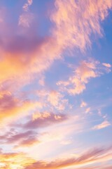 Obraz premium sunset sky with soft pink and orange clouds in a serene gradient dreamy atmospheric background