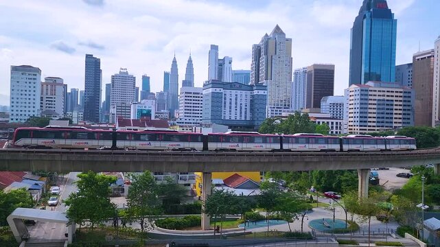 Kuala Lumpur skyline in the daytime - Malaysia. 4K timelapse of cityscape at Kuala Lumpur, Malaysia.