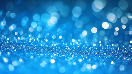 Abstract blue glitter bokeh background.