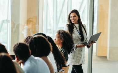 Female CEO leading a business meeting with professionals exchanging innovative ideas and strategies