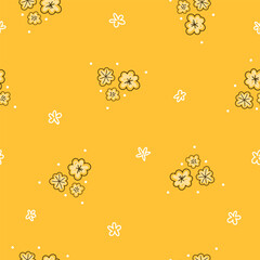 Stylish seamless pattern featuring summer wildflowers on a yellow background, perfect for elegant fabric, wallpaper, or print designs