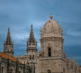 Naklejka premium The magnificent spires and dome of the Jerónimos Monastery in Belém, Lisbon (Lisboa), Portugal. A masterpriece of Manuelite architecture and a UNESCO World Heritage Site