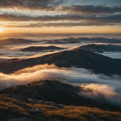 A sunrise view from a mountaintop, with clouds blanketing the valleys below.