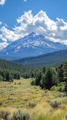 Fototapeta premium A peaceful mountain view with snow-capped peaks, soft clouds floating across the sky, and the quiet serenity of the natural landscape.
