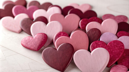 Obraz premium Multicolored hearts in 3d rendering style create a bright and romantic scene perfect for Valentine's Day.Festive background with red and pink hearts for Valentine's Day