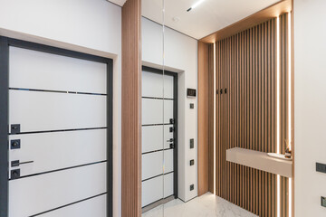 stylish interior design of a new house with light walls and a wardrobe