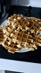 Home made waffles  in black plate 