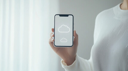 Cloud Storage on the Go: A woman's hand confidently displays a smartphone with a cloud storage icon, showcasing the convenience and accessibility of modern technology.  