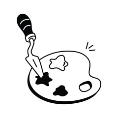 A palette knife used for mixing and applying paint on a palette