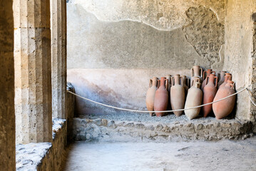 Ancient amphorae in a house in Pompeii Pompeii was destroyed by the volcanic eruption of Vesuvius in 79 BC