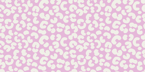 Pastel seamless leopard print pattern with white spots, organic shapes on a  soft pink background. Bold, modern, and trendy design ideas for textiles, fashion,  creative branding projects.