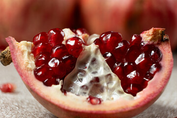 Close-up of pomegranate seeds, an open fruit, the benefits of pomegranates.