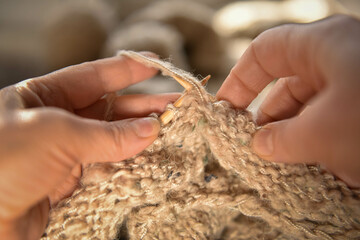 Knitting with needles. The hobby concept - knitting