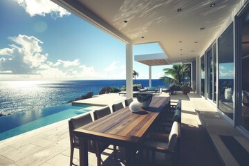 Fototapeta premium Table Ocean. Modern Luxury Dining Table on Sunny Patio with Ocean View