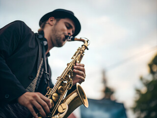 Fototapeta premium man playing saxophone