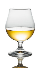 Brandy in a snifter on a white background.