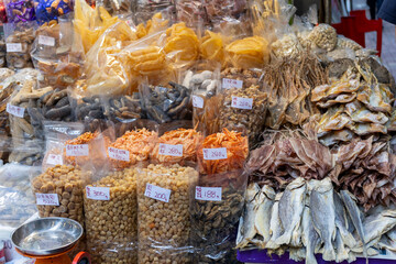 Dried seafood displayed at a bustling market in Hong Kong