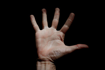 hand gesturing in the shadow, sensations