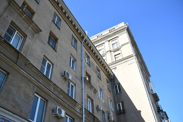 Architecture of old Soviet Union houses in Stalin's Empire style. Exterior of the facade of a...