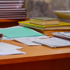 Books and office supplies on the table