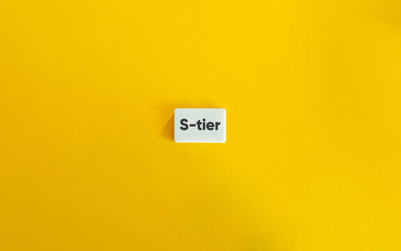 S-tier Term and Concept Image. Text on Block Letter Tile on Yellow Background.
