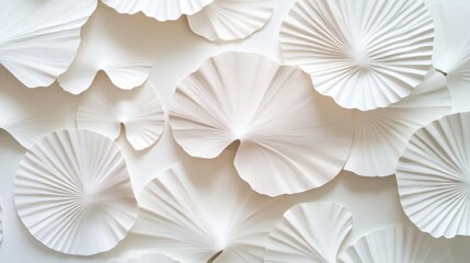 Abstract background of white paper leaves.