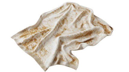 A wrinkled piece of textured fabric with a golden-brown pattern draped casually on a flat surface, showcasing its intricate design and soft texture.